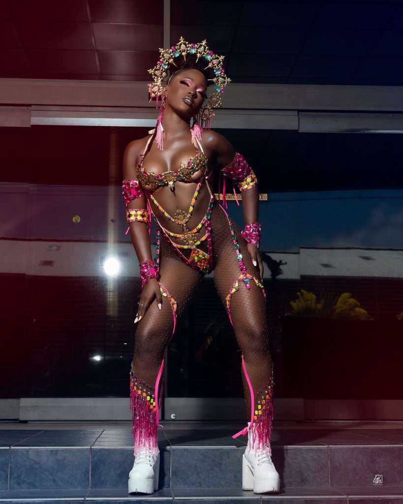Photo of Tara Richardson, Caribbean model, showcasing an elaborate carnival costume