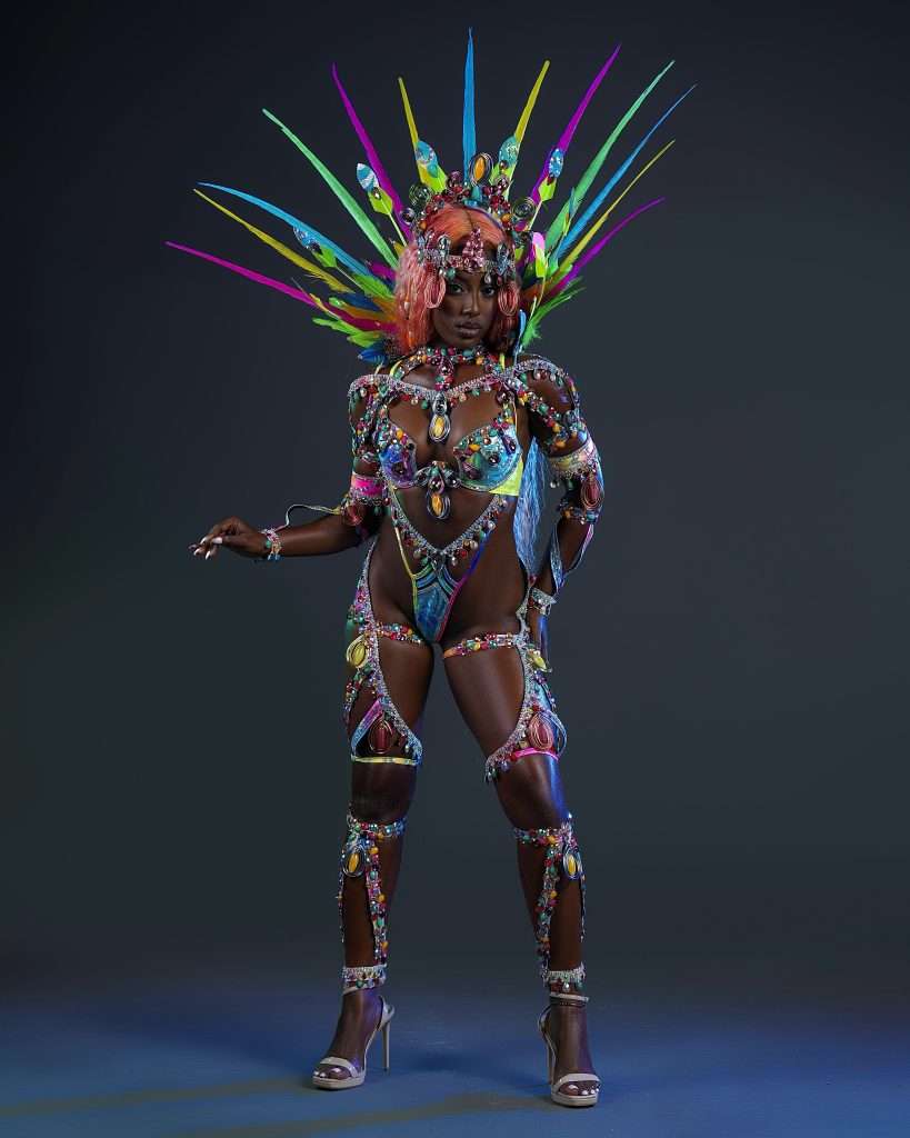 Caribbean model Tara Richardson in feathered carnival costume